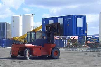 Moving a converted shipping container using a forklift