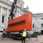 Crane delivery of container to London museum