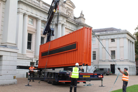 Crane delivery of container to London museum