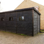 Exterior view of timber clad shipping container