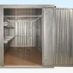 6m flat pack container shelving on one side and rear