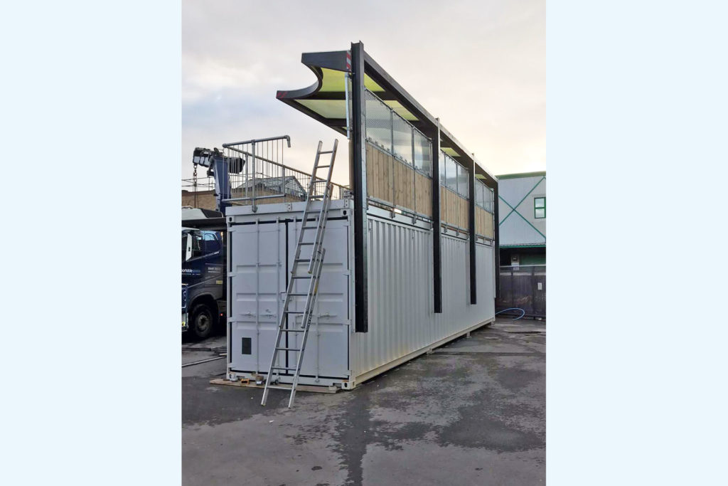 party roof added to converted container bar